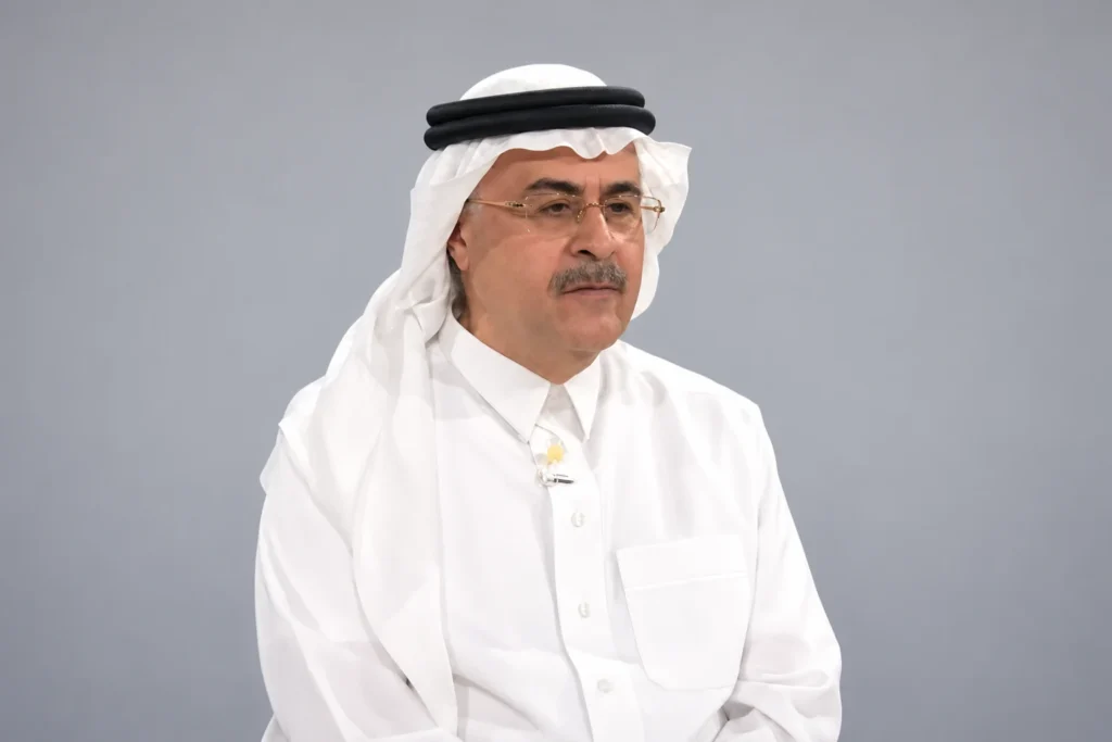AI-assisted adaptation of Amin H. Nasser’s 2024 archive portrait against a neutral background.