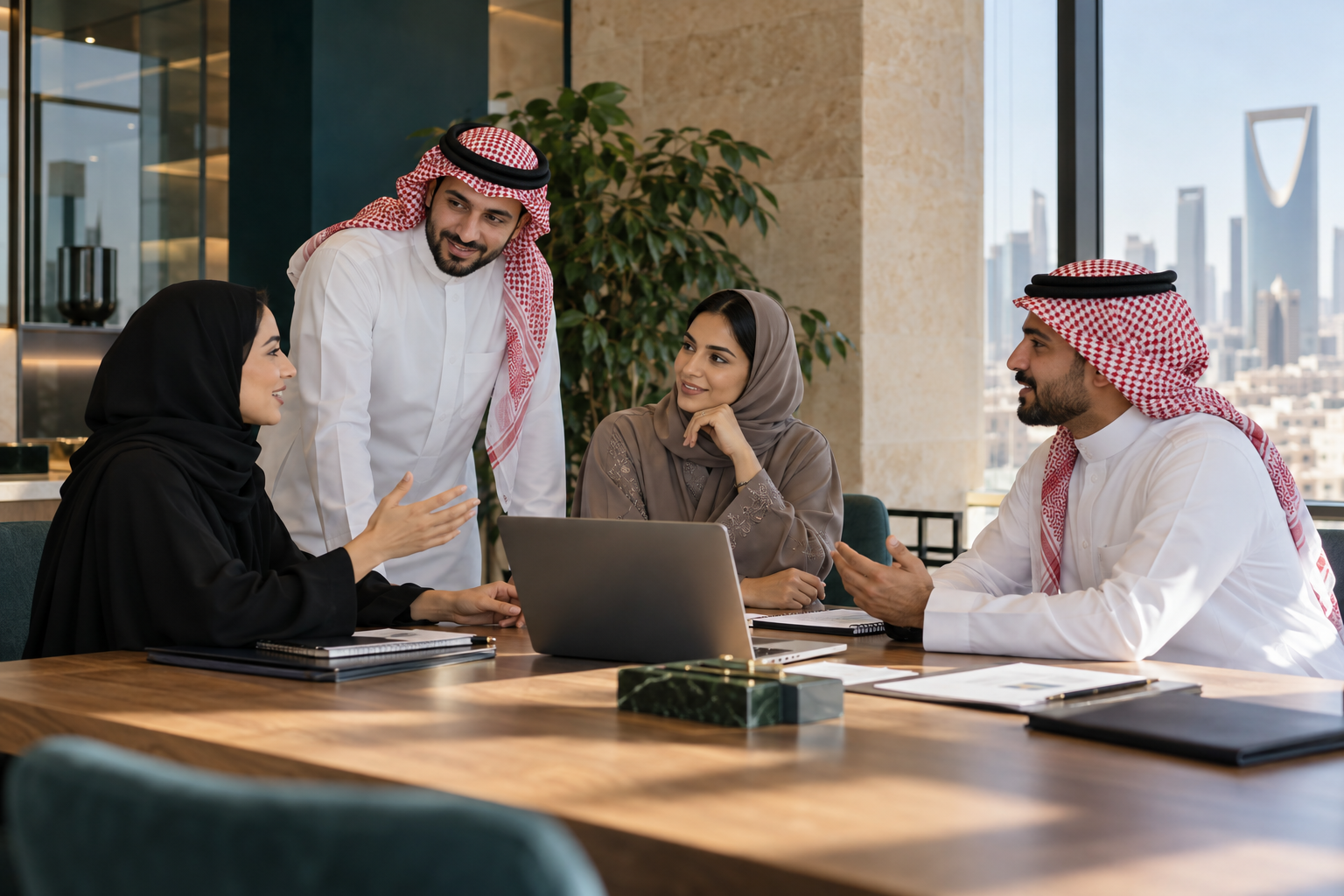 Saudi professionals collaborating on a business project